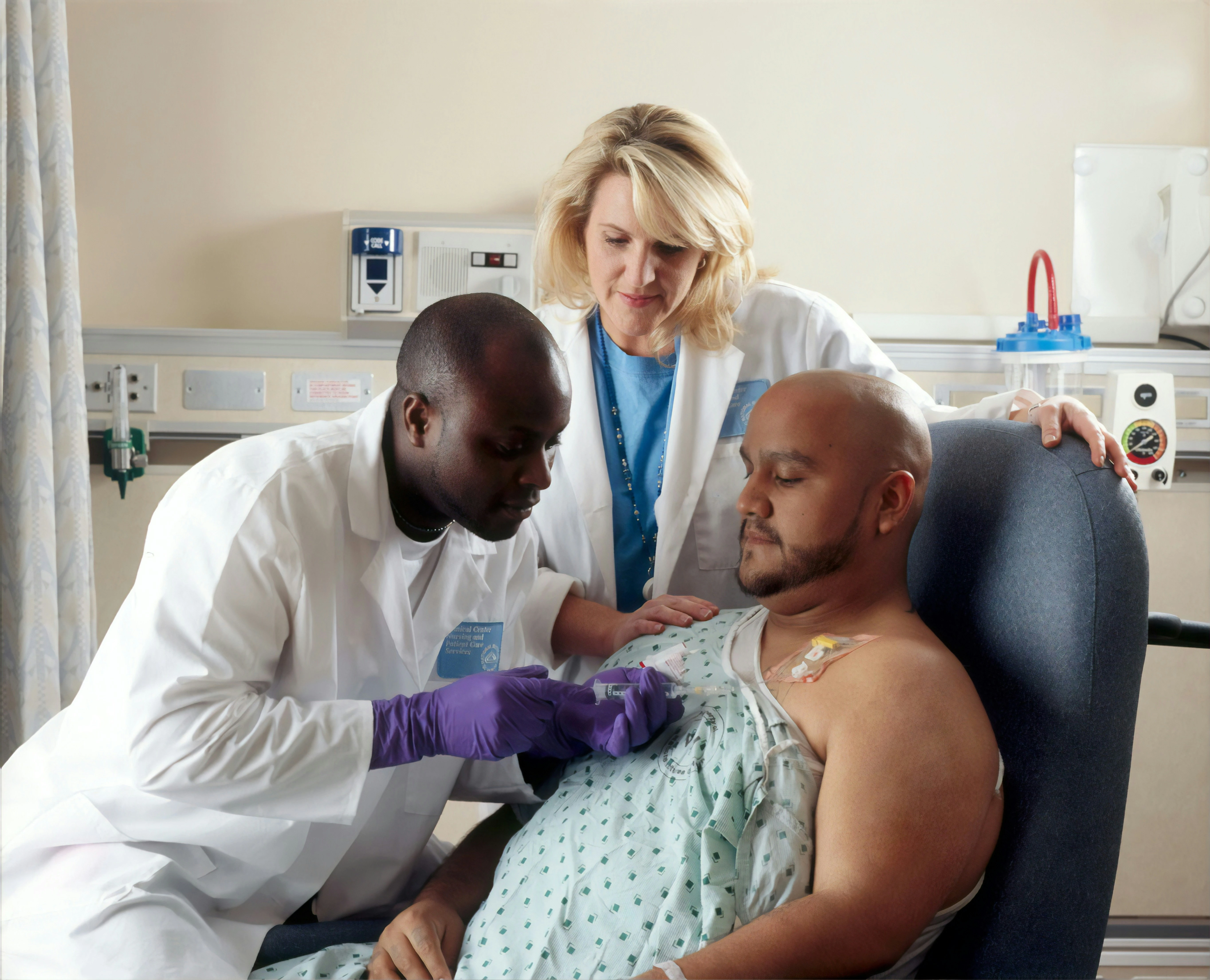 Professional healthcare workers preparing for overseas employment in a clinical setting.